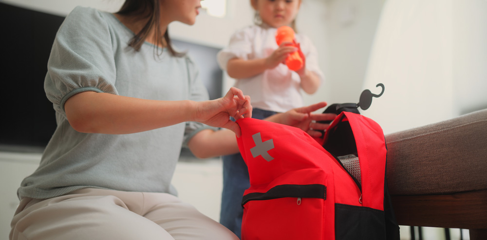 Mom and child preparing for an emergency.